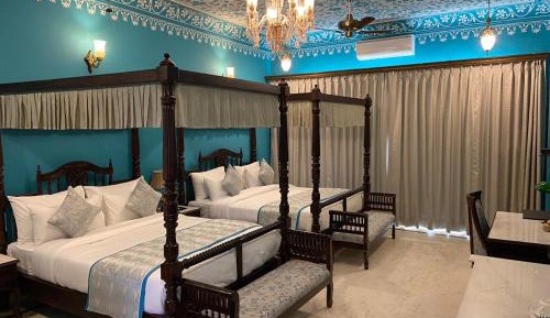 Royal Suite: Complimentary use of the fabulous swimming pool, kids stay complimentary, secure gated parking, free games, activities at the farm resort, and a dedicated travel desk to assist with local sightseeing tours & memorable travel experience
