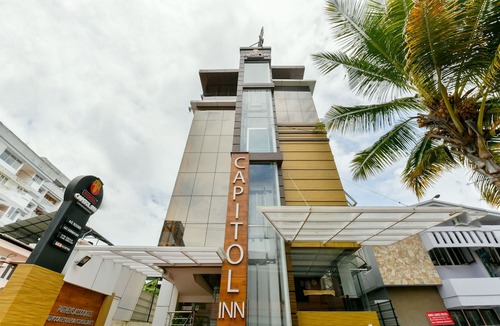 Kaloor Hotel | OYO 18604 Puthens Capitol Inn
